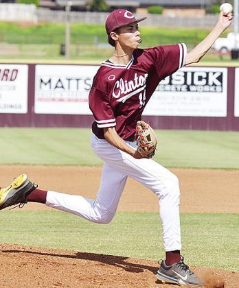 Clinton’s Conner Meget pitches the ball during the Reds’ home game Tuesday against the Canute Trojans. CDN | Sam Goodwyn
