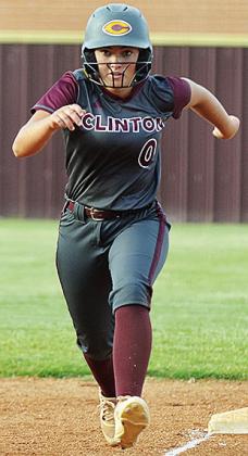 No. 0 Laney Anderson hustles home for a run during Clinton’s home game Monday. CDN | Sam Goodwyn