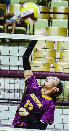 No. 13 Karely Aguilar hits the ball over the net during Clinton’s game against Sante Fe South. CDN | Sam Goodwyn