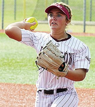 Clinton’s Laney Anderson hurls the ball to first for the out during the Lady Reds’ game in Elk City. CDN | Sam Goodwyn