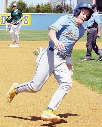 A-B’s Rylan Moore rounds third on his way home to score during the Indians’ spring season home game against Thomas. CDN | Sam Goodwyn