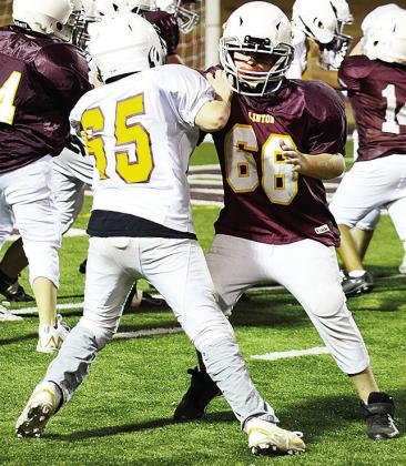 No. 66 Ben Tarkington blocks No. 65 Waylon Mayfield during the Clinton NEXT League championship game Monday in the Tornado Bowl. CDN | Sam Goodwyn