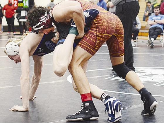 Tristan Cardenas attempts to control his opponent during the regional tournament last weekend in Weatherford. CDN | Sam Goodwyn