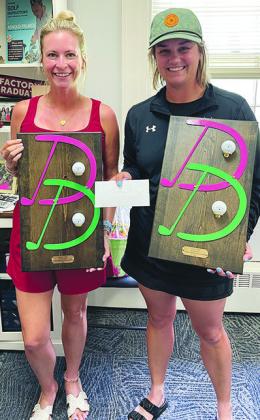 Taylor Adler, left, and Jessica Perry, both of Weatherford, show off their trophies after winning the A Flight in the WGA All-Women’s Tournament at Riverside. CDN | Courtesy photo
