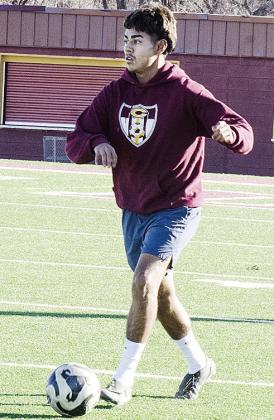 Ruben Labastida looks for a teammate during a recent Clinton soccer practice. CDN | Sam Goodwyn