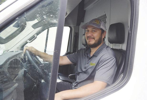 AJ Juarez ready to make his morning deliveries behind the wheel of the store delivery van just outside of Kluver’s Appliances &amp; Home Furnishings. CDN | Micah Ashcraft