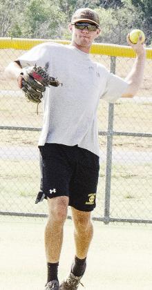 Jett Cunningham throws the ball in from the outfield during the softball tournament.