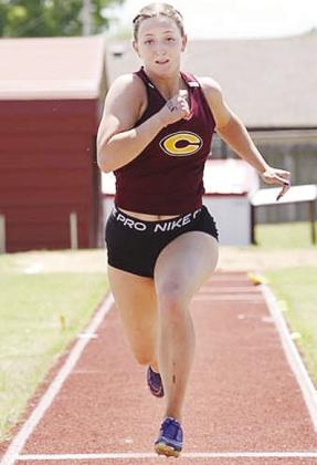 Clinton’s Presley Evans practices her long jump during a recent practice in prepartion for the new track and field season. CDN |Courtesy Photo