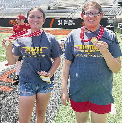 Sawyer Acosta, left, and Sophia Williams show off their gold medals after competing in the Unified Bocce Ball competition at the Special Olympics Summer State Games at Oklahoma State University. CDN |Courtesy Photo
