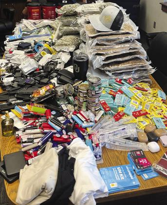 A table full of contraband seized by the Oklahoma Department of Corrections in 2025. CDN | Courtesy photo