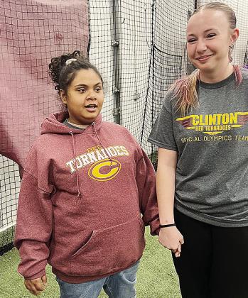 Kinnidi Kirkendoll, left, and Madison Walker watch the bocce ball tournament Friday at the high school. CDN |Courtesy Photo