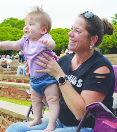 Malia Terrell and her grandmother Jennifer Terrell enjoying the music at the Levitt AMP Clinton Music Series concert.