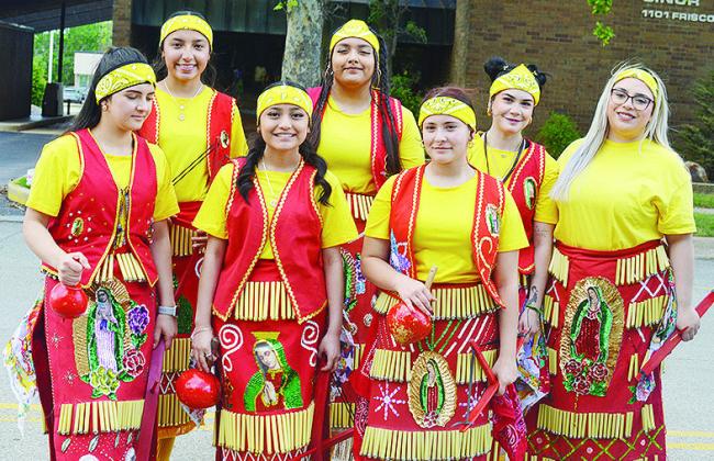 At Friday’s Cinco de Mayo Parade, dancers in Mexican attire performed on Frisco Avenue. Front from left are Idalia Pelayo, Sheyla Chom-Morales, Aislinn Armendariz; back, Evelyn Hisparo, Lizbeth Armendariz, Nidellyn Armendariz and Penelope Guzman.