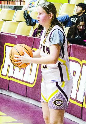 No. 23 Sydney Pugh looks for an open teammate as she tries to inbound the ball during Clinton’s eighth-grade game against Anadarko in the Tornado Dome. CDN |Sam Goodwyn