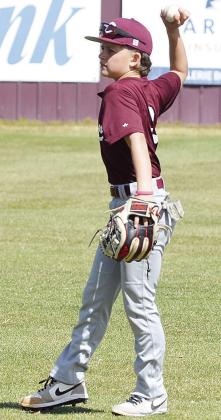 Cohen Bridges throws the ball, as he warms up for the game against Kingfisher. CDN | Sam Goodwyn