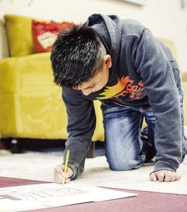 Students show Clinton spirit designing bags for Route 66 Museum