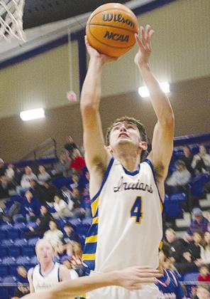 No. 4 Kaden Waldrop fights through a defender for the layup in A-B’s game against Hammon. CDN | Sam Goodwyn