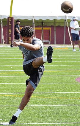 Clinton’s Luis Rodriguez practices kicking field goals in the Tornado Bowl during a practice in the preseason. CDN | Sam Goodwyn