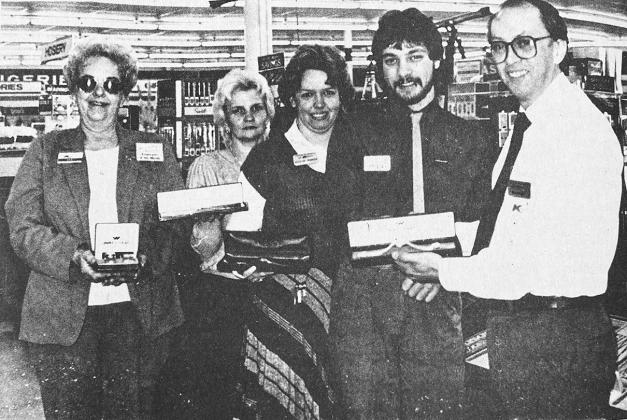 40 YEARS AGO Kmart officials announced that the local store had placed second in the district in sales increases in the jewelry department. Department sales persons were presented with watches. Pictured, from left, were Mae Henley, Cheryl Garcia, assistan