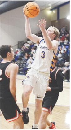 No. 3 Jiles Southall leaps in the air as he attempts a layup over a defender during A-B’s third-place game against Cheyenne-Reydon in the Western Equipment Classic. CDN | Sam Goodwyn
