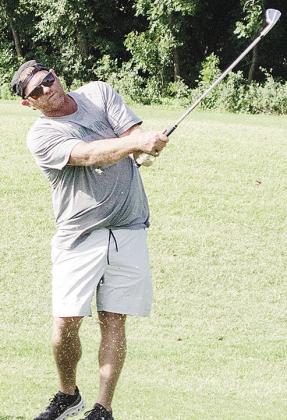 Wade Cummins watches the ball fly after driving it far during a round of golf at Riverside. CDN | Sam Goodwyn