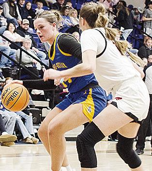 A-B’s Peyton Lambeth, left, drives against the defender during the Lady Indians’ game against Cheyenne-Reydon in the championship of the Western Equipment Classic. CDN | Sam Goodwyn