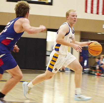 Arapaho-Butler’s Jiles Southall drives to get around the defender during the Indians’ home game against Fort Cobb last year. CDN | Sam Goodwyn