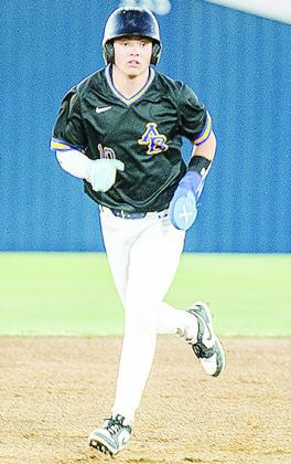 Arapaho-Butler’s Jack Goldsberry sprints to third base during the Indians’ win Thursday over Fletcher at home. CDN | Sam Goodwyn