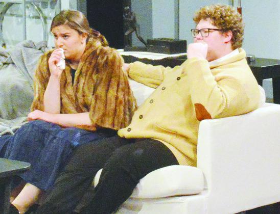 Actors Amelia Hardaway and Boone Hardaway listen closely to a reveal in “Dial M for Murder” at Southwest Playhouse. The play will continue this weekend. CDN | Christian Jacobsen