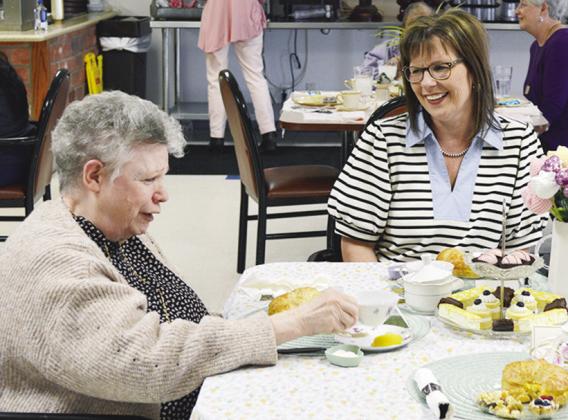 Paulyn West and Hayley Begert sit together for a Mother’s Day tea party at River Valley Skilled Nursing and Therapy. CDN | Christian Jacobsen