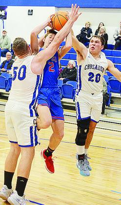 No. 50 Cruze Bittle and No. 20 Zach Zyback come together to help stop the Bray-Doyle player during CBA’s first-round win over the Donkeys. CDN | Sam Goodwyn