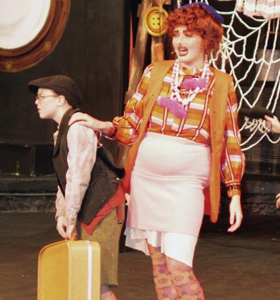 Ainsley House, left, as James is picked up for the first time by Opal Smith as Aunt Sponge during “James and the Giant Peach Jr.” at Southwest Playhouse. CDN | Christian Jacobsen