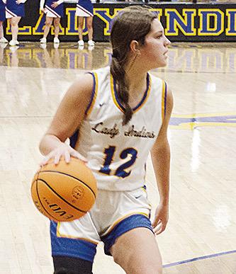 A-B’s Channing Cudd looks for an open teammate during the Lady Indians’ win over Hammon. CDN | Sam Goodwyn