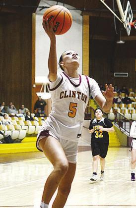 Clinton’s Lillian Lime goes up for the layup during the Lady Reds’ home win over the Astec Lady Comets. CDN | Sam Goodwyn