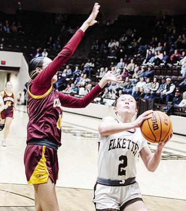 No. 12 Rihanna Ellis goes for the block during Clinton’s game against Elk City on the road. CDN | Sam Goodwyn