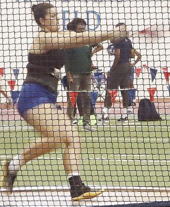Kat Meacham performs in the weight throw over the weekend during the Bob Timmons Challenge at the University of Kansas. CDN | Courtesy photo