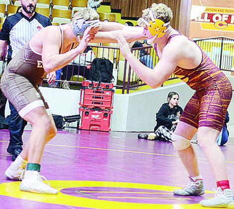 Clinton’s Marcus Wilson, right, grapples with his opponent from Elk City during the district duals last season in the Tornado Dome. CDN | Sam Goodwyn