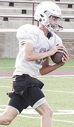 Clinton’s Judd Hall cuts upfield after catching the ball during spring practice in the Tornado Bowl. CDN | Sam Goodwyn