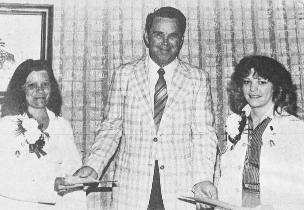 40 YEARS AGO Outstanding employee certificates and $50 cash awards were presented to Cardio-Pulmonary Department workers at left, Karen Greer and at right, Joy Eckley. They were shown being congratulated by Clinton Regional Hospital President Jesse Hayes.