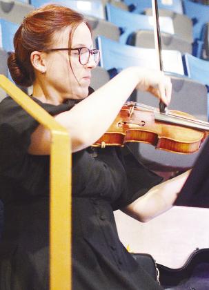 Brianna Bull playing the violin as part of the live bluegrass band during the Southwest Playhouse’s production of “Bright Star.” CDN | Micah Ashcraft