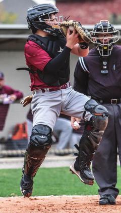 Tate Wilhelm hops to his feet