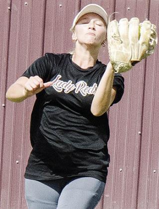 Clinton’s Hadley Meget catches the fly ball in the outfield Wednesday during practice at the high school. CDN | Sam Goodwyn