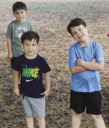 A small group of boys came to see what was happening in the playground at Nance Elementary. From left, are Levi Medina, Javy Arriaga and Lincoln Adney. CDN | Christian Jacobsen