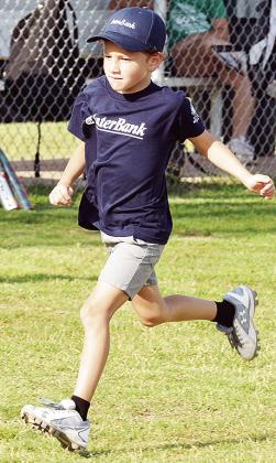 Tad Stovall hustles home during the first inning of his Noon Lions T-Ball game Tuesday. CDN |Sam Goodwyn