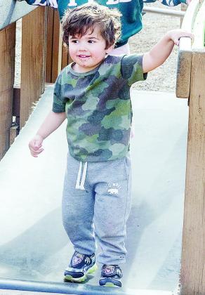 Bodhi Stewart enjoys a day playing at the M.T. and Helen Gholston Children’s Park at Acme Brick Park. CDN | Sam Goodwyn