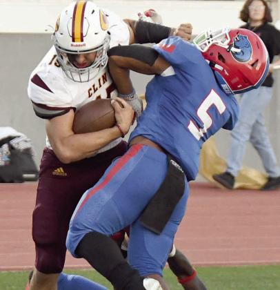 Reds win first district game