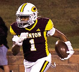 No. 1 Derren Hester carries the ball against Elgin during Clinton’s homecoming game against the Owls. CDN | Micah Ashcraft
