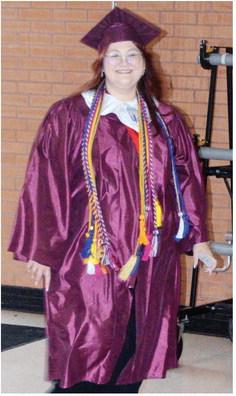 Marlen Nava stands excited to have her senior graduation ceremony at the Tornado Dome.