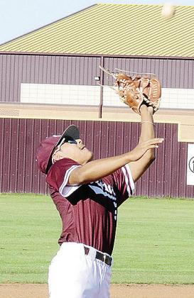 Clinton’s Jesus Gutierrez focuses on the ball as he goes to catch the pop fly during the Reds’ game against Weatherford. CDN | Sam Goodwyn