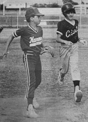 40 YEARS AGO Clinton base runner Eric Schimmel troted into third base during a 4-3 victory by the 11-and-12-year-old Broncos over Hammon. The Clinton team owned an 8-2 season record after splitting a doubleheader with Leedey, winning by a 5-3 score before